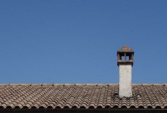 Graphite shingle tiles and a chimney