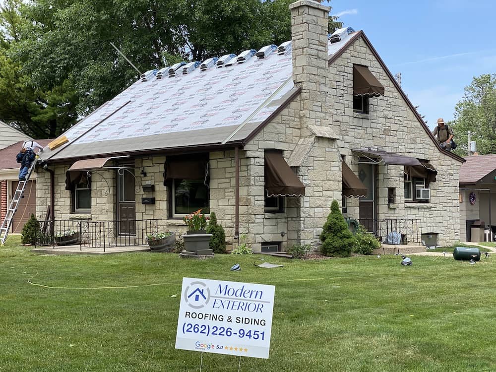 a house with a sign in front