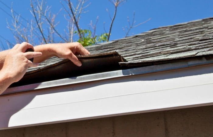 roof inspection, checking under the shingles