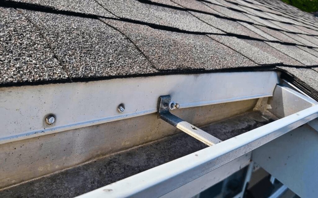 gutter corner with asphalt shingle roof