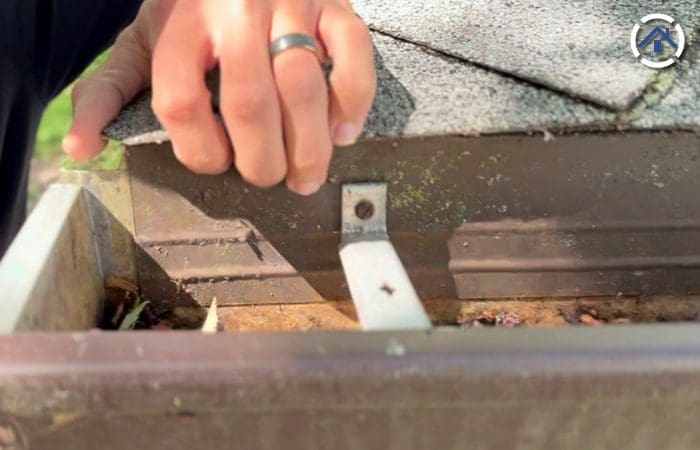 Gutter apron installed behind the shingles and over the gutters