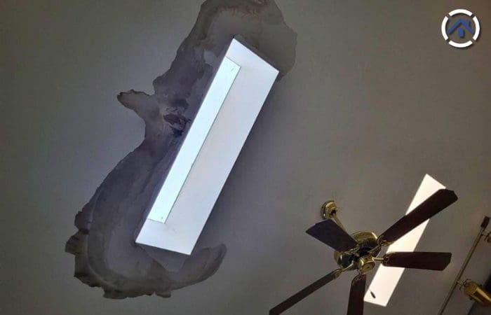 Water stain on ceiling caused by a leaking skylight