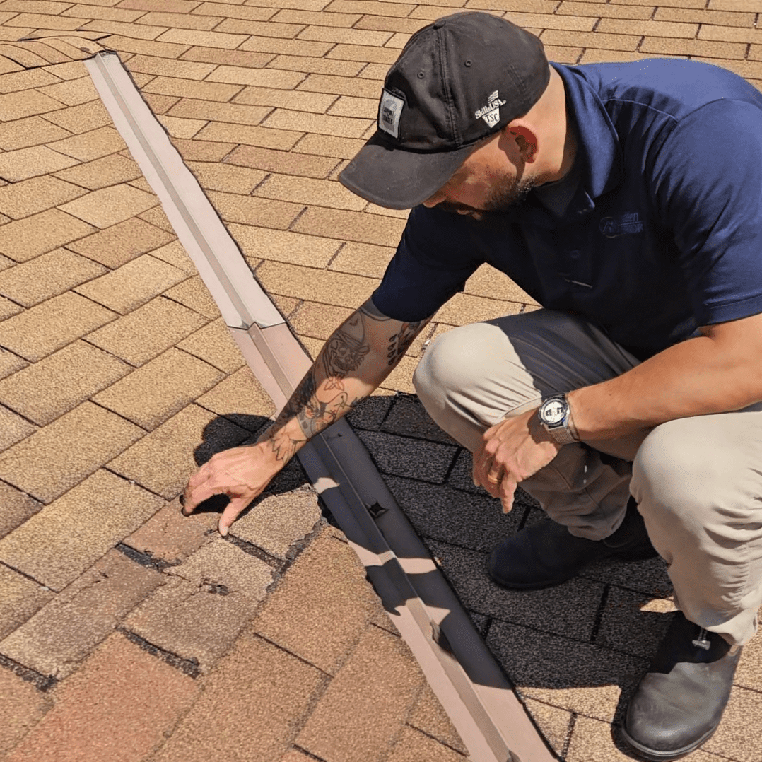 Modern Exterior professional inspecting a roof with damaged shingles identifying areas for expert roof repair services.