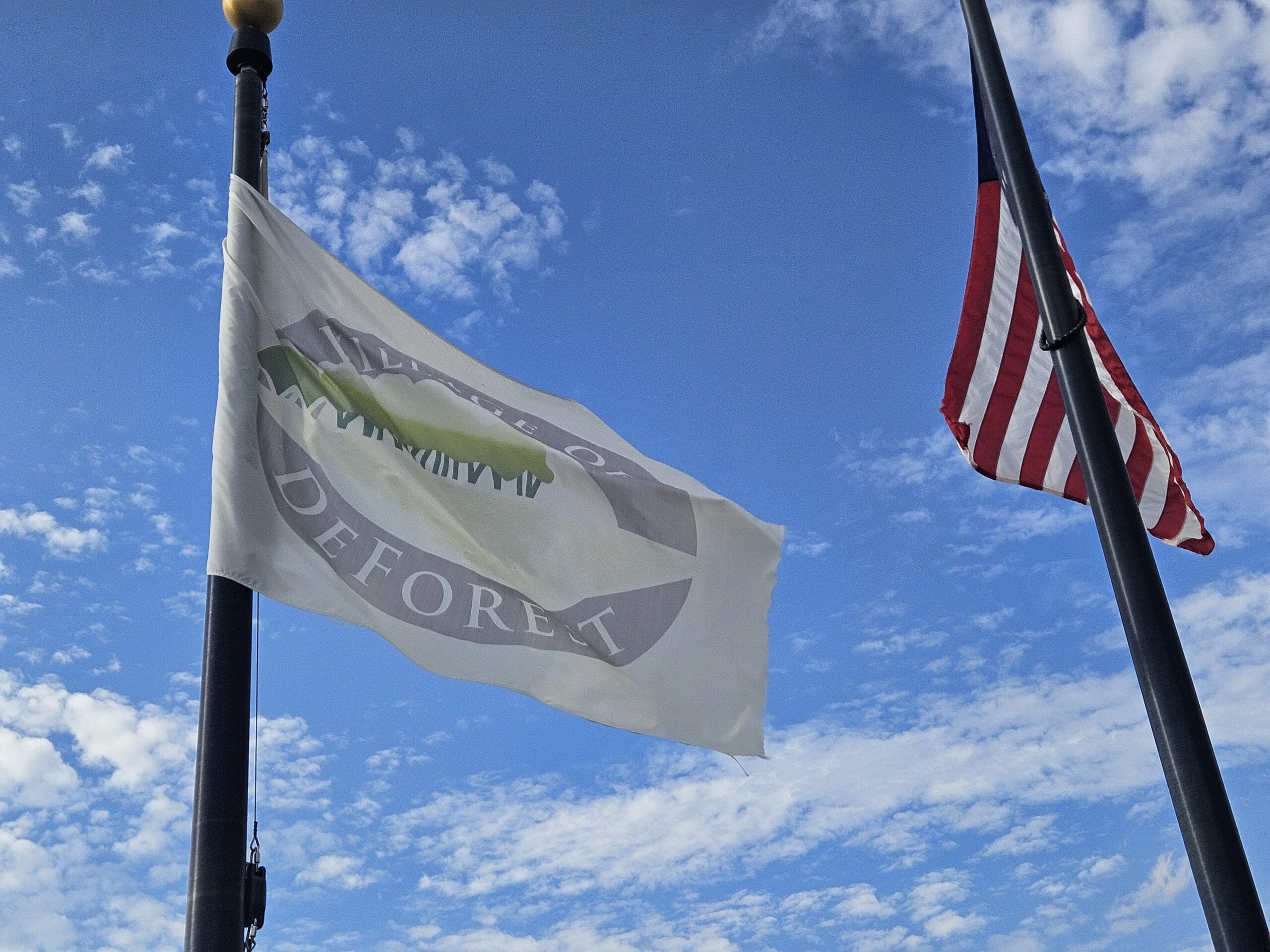 Flag of the Village of DeForest, Wisconsin, where Modern exterior Roofing provides professional roofing and exterior home services.