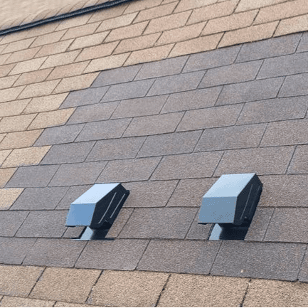 Completed roof repair on Milwaukee condo with new shingles and upgraded vent system installed by Modern Exterior, restoring protection and airflow