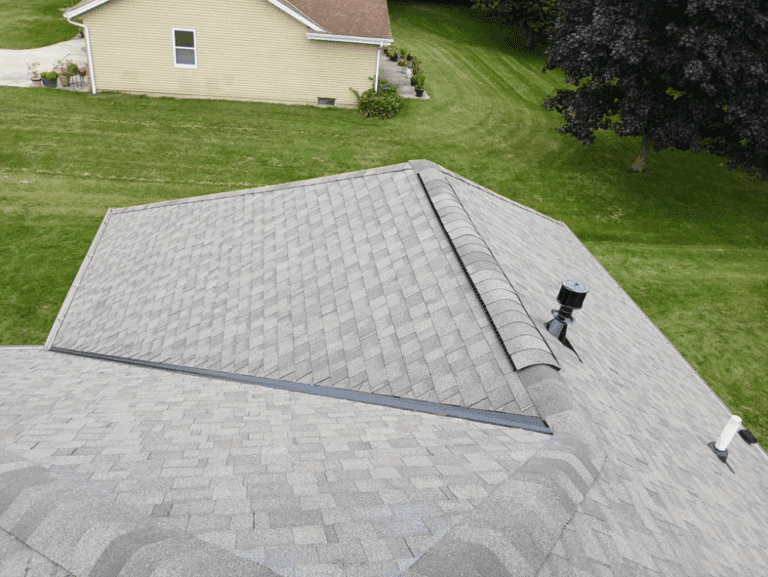 Completed roof replacement on Hales Corners home with durable IKO Cambridge Weatherwood shingles, Class 3 hail-resistant for superior impact protection, installed by Modern Exterior