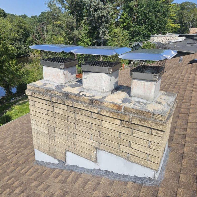Chimney on a Cedarburg home before repair and replacement work by Modern Exterior