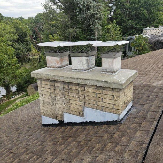 New concrete chimney cap installed on a Cedarburg home by Modern Exterior to protect chimney from water and weather damage