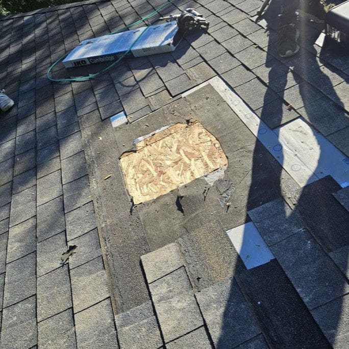OSB roof deck patch installed after chimney tear-down on a Brookfield home by Modern Exterior, preparing for shingle replacement