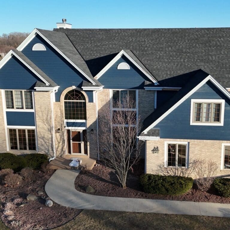 Final front view of Brookfield home featuring newly installed Nordic Granite Black roof and completed exterior upgrade