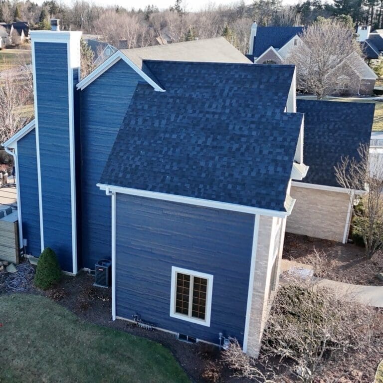 After side view of Brookfield home featuring newly installed Nordic Granite Black roof and upgraded roofing system