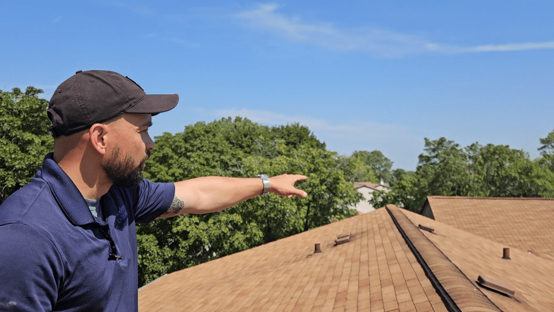 Modern Exterior roofing expert inspecting a residential roof.