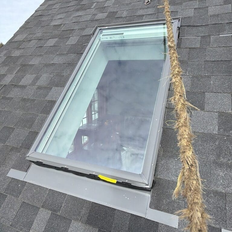 New Velux FSC04 solar skylights installed during Nordic roof replacement on Brookfield home