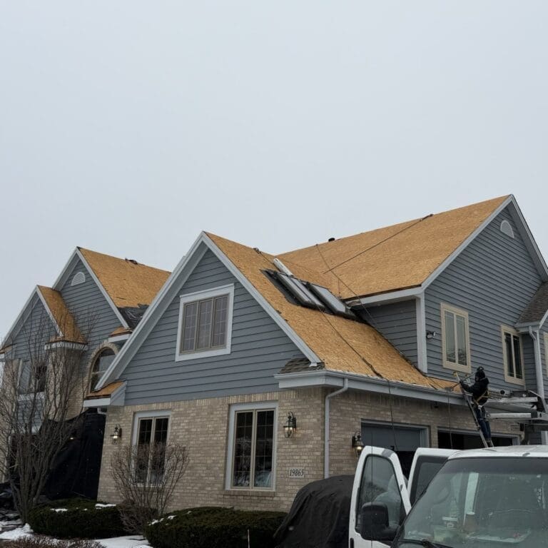 After tear-off showing exposed OSB roof decking prior to installation of new Nordic roofing system in Brookfield